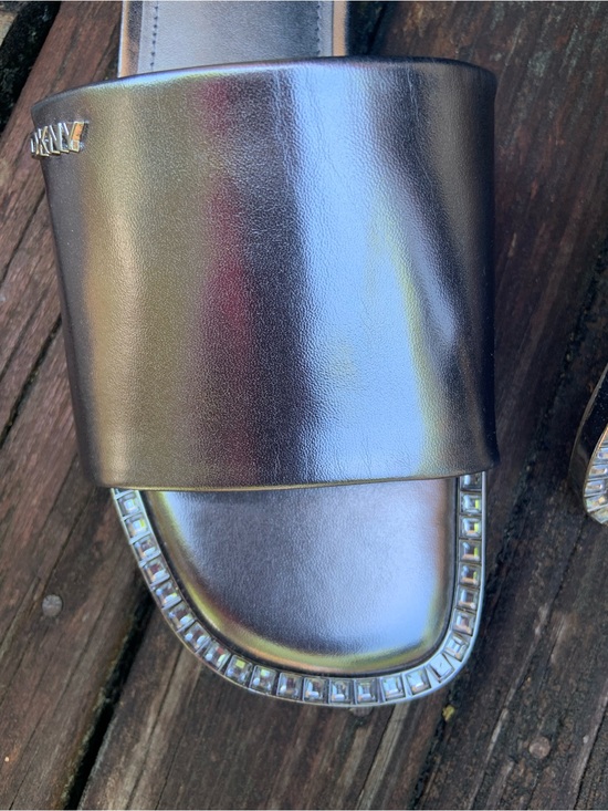 Dkny Shoes - DKNY NWT Metallic Silver Slide Mules with Rhinestone Trim
Size 7.5